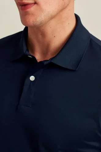 La Performance Golf Shirt: tinta unita e a righe