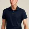La Performance Golf Shirt: tinta unita e a righe