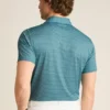 La Performance Golf Shirt: tinta unita e a righe