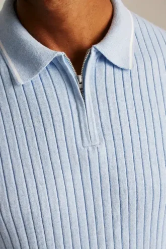 Polo morbida con zip